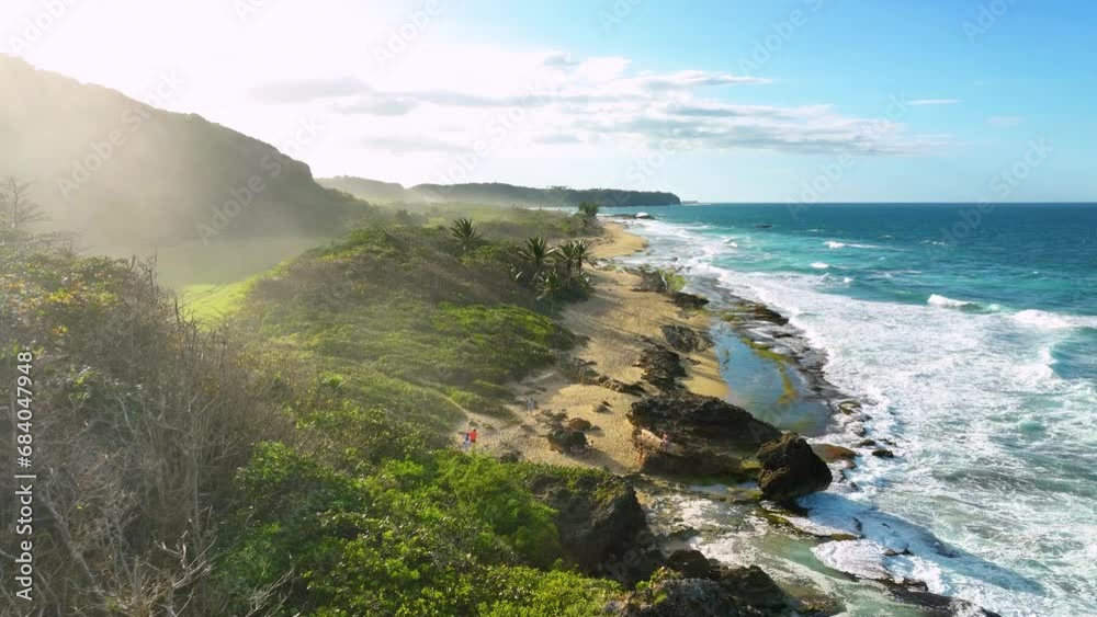 Puerto Rico Adobe Push in overhead views of people exploring a beach in the afternoon ...
