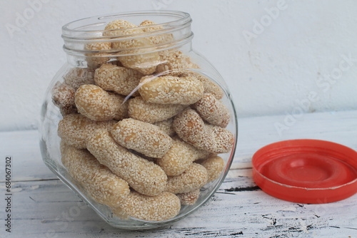 Indonesian snack called mancung in a jar on the table photo