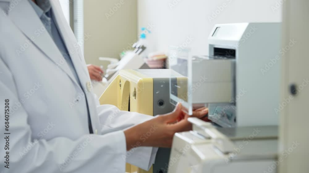 Group of researcher using experimental equipment. Group of researcher using experimental equipment.