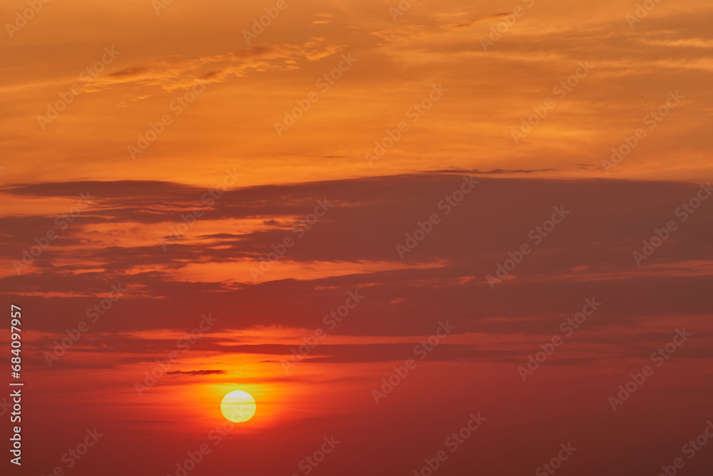 The sky was ablaze with vibrant oranges and pinks as the sun dipped below the horizon The sky was ablaze with vibrant oranges and pinks as the sun dipped below the horizon