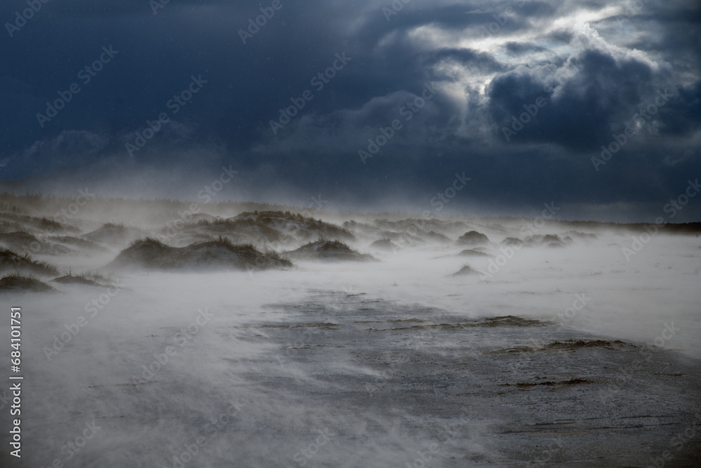 Snowy storm by Baltic sea.