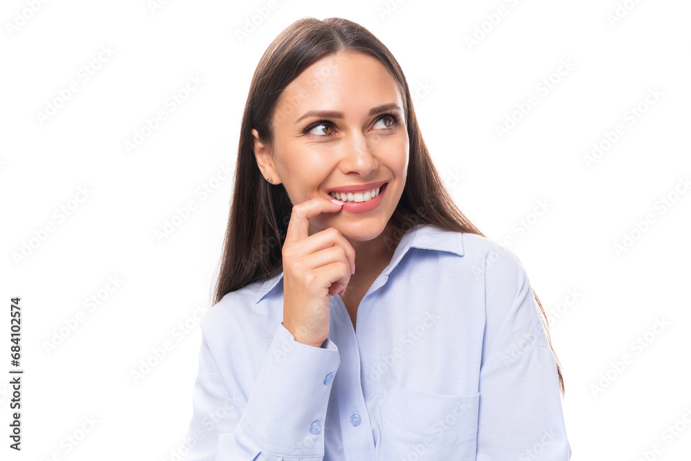 close-up portrait charming young brunette european woman dressed in sky blue shirt over isolated background with copy space close-up portrait charming young brunette european woman dressed in sky blue shirt over isolated background with copy space