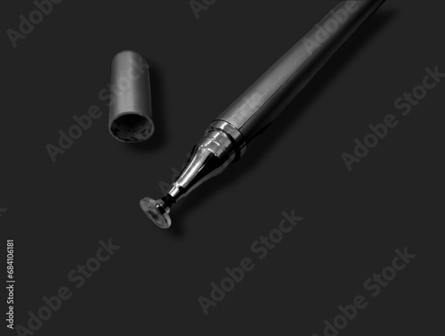 Stylus pen isolated on black background