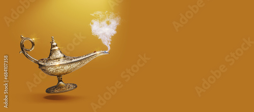 Foto Golden magic lamp on gold background