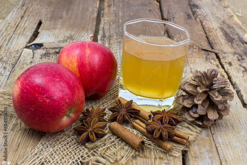 Apple juice, fresh apples, cinnamon sticks and anise stars