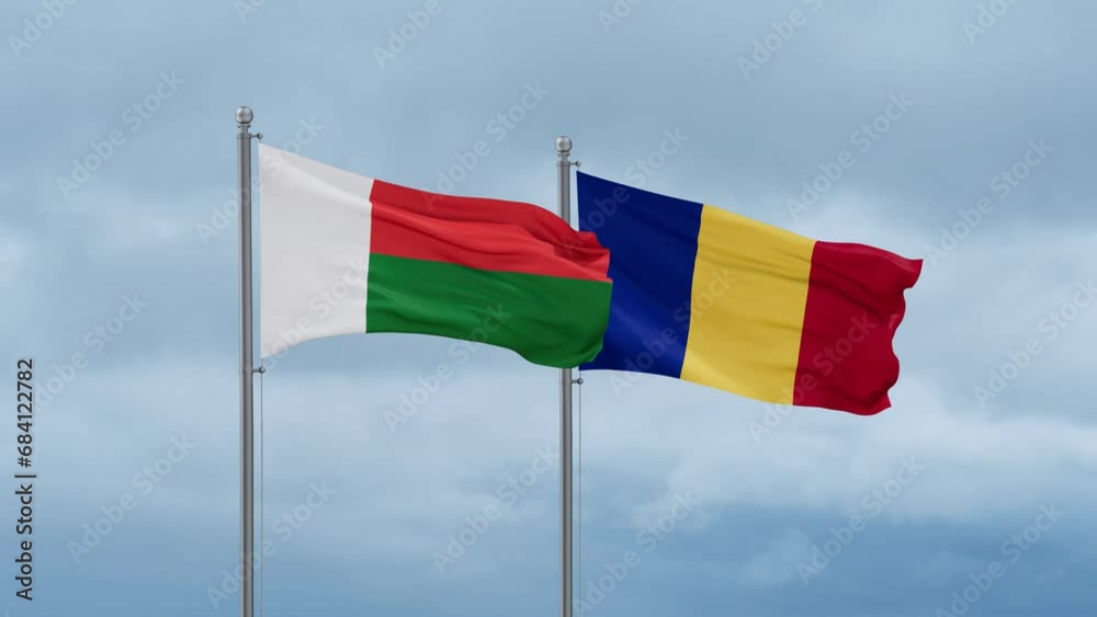 Chad flag and Madagascar flag waving together on cloudy sky, endless seamless loop, two country relations concept Chad flag and Madagascar flag waving together on cloudy sky, endless seamless loop, two country relations concept