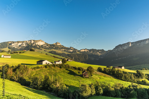 Appenzellerland, landscape with farms and green meadows, view of Hoher Kasten and Kamor in the Alpstein mountains, Bruelisau, Canton Appenzell Innerrhoden, Switzerland photo