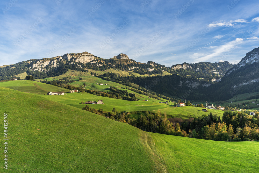 Appenzellerland, landscape with farms and green meadows, view of the Hoher Kasten and the village of Bruelisau in the Alpstein mountains, Canton Appenzell Innerrhoden, Switzerland