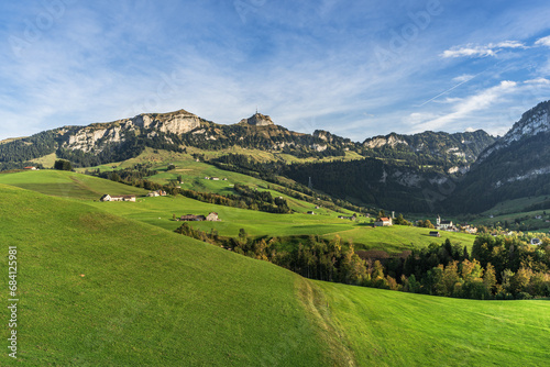 Appenzellerland, landscape with farms and green meadows, view of the Hoher Kasten and the village of Bruelisau in the Alpstein mountains, Canton Appenzell Innerrhoden, Switzerland