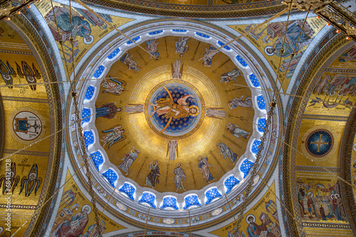 View of the dome of Saint Sava Orthodox Church with mosaic decorations, fresco and Christian icons in Belgrade, Serbia photo