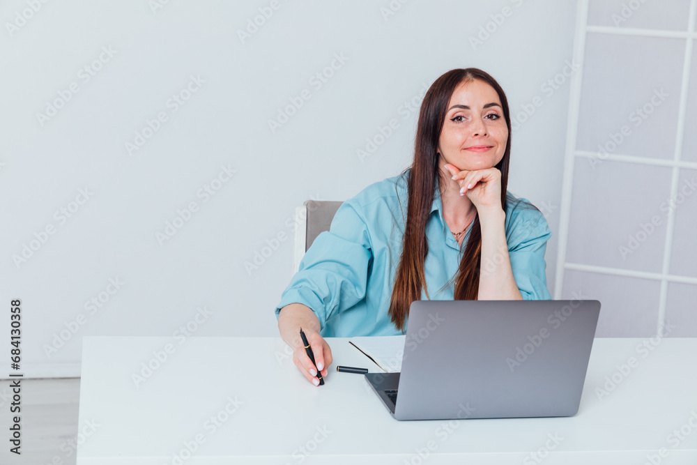 Young woman sitting on online meeting in outdoor cafe, talking to laptop camera, explaining something, drinking coffee. Young woman sitting on online meeting in outdoor cafe, talking to laptop camera, explaining something, drinking coffee.