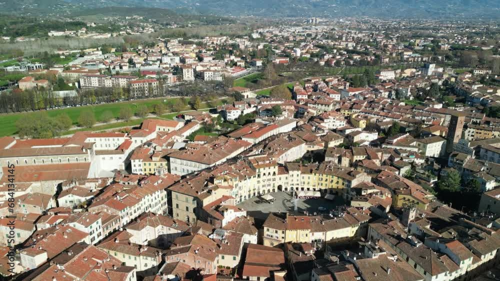 Lucca, Tuscany. Aerial view of city center with Piazza Anfiteatro and medieval buildings Lucca, Tuscany. Aerial view of city center with Piazza Anfiteatro and medieval buildings