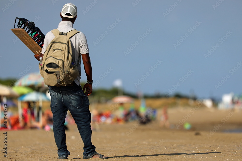 illegal unauthorized hawker in the beach by the sea in summer illegal unauthorized hawker in the beach by the sea in summer
