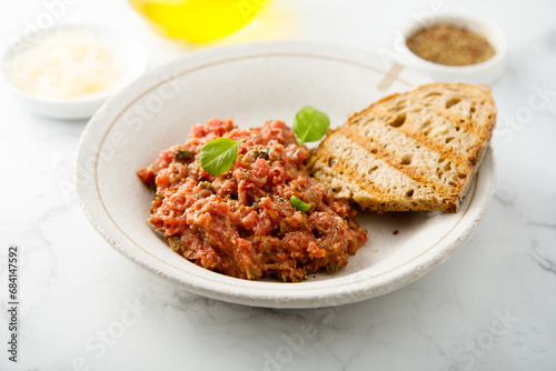 Traditional steak tartare with capers