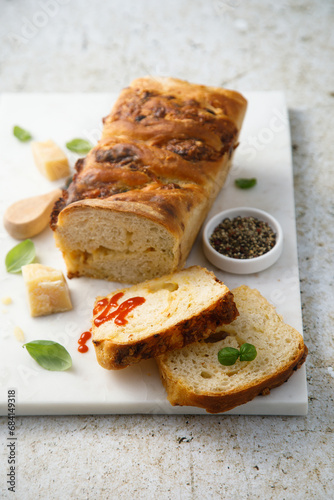 Homemade cheese bread with fresh basil