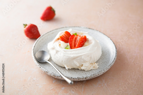 Traditional Pavlova dessert with fresh strawberry