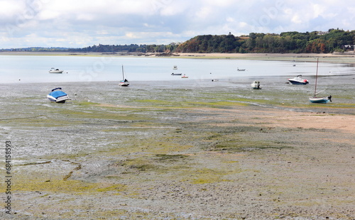 aground boats during low tide in the seabed in the Normandy region in France photo