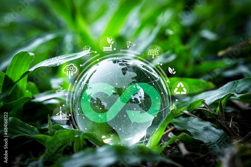 Crystal world on green grass with infinity symbol and environment ecology include reuse reduce recycle carbon reduction and alternative consumption energy for circular economy and sustainable concept. photo