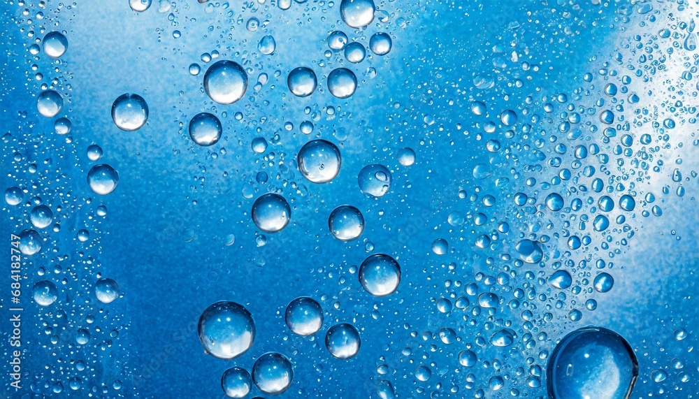 water drops or oil bubbles on blue background droplets panorama picture