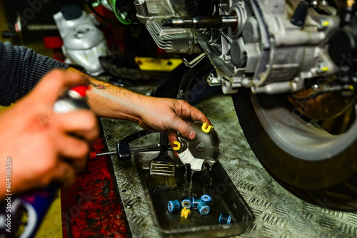 Italian scooter Variator repair, Motorcycle mechanic repairman 