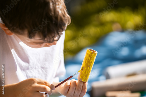 child plainting photo