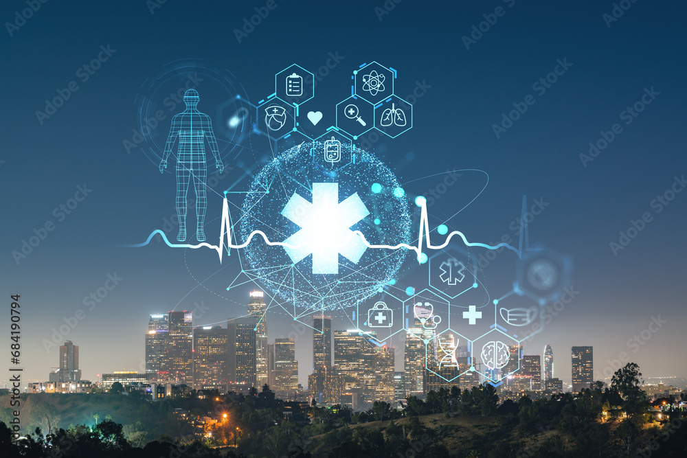 Illuminated Skyline panorama of Los Angeles downtown at night, California, USA. Skyscrapers of LA city. Hologram healthcare digital medicine icons. The concept of treatment, Threat of pandemic