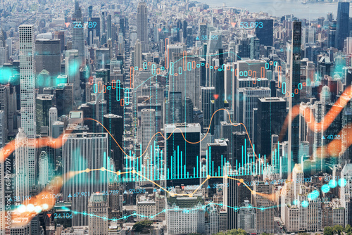Aerial panoramic helicopter city view of Midtown Manhattan neighborhoods and Central Park, New York, USA. Forex graph hologram. The concept of internet trading, brokerage and fundamental analysis