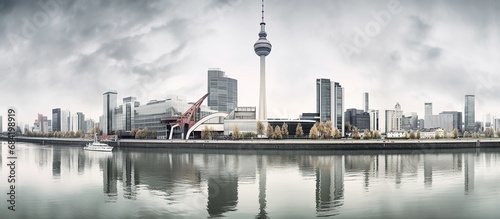 Dusseldorf skyline vector colorful poster on beautiful triangular texture background