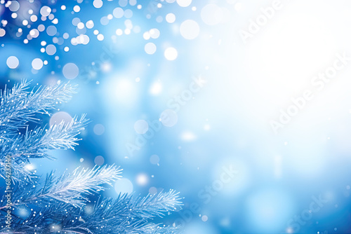 Abstract winter background with bright blue fir branches and bokeh