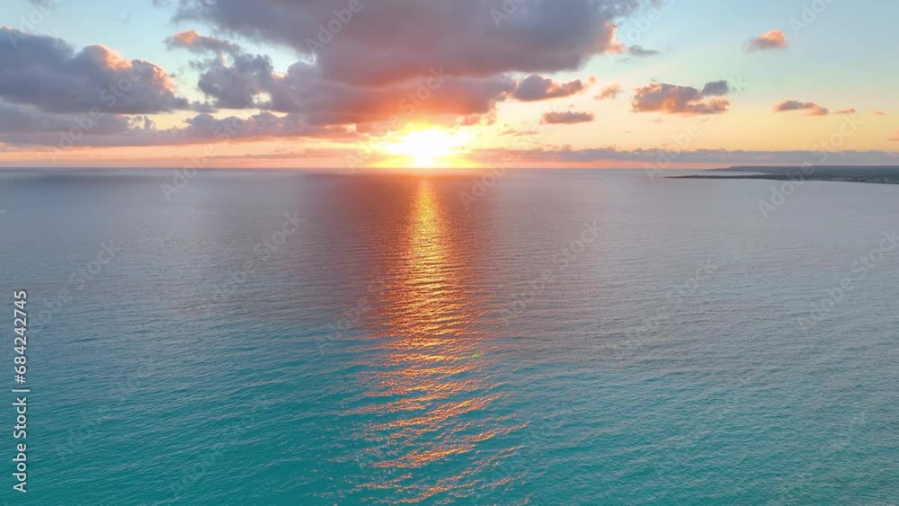 Slow motion of large waves of the Atlantic Ocean illuminated by sunset light. Cinematic drone of sunset over the sea. aerial view. Slow motion of large waves of the Atlantic Ocean illuminated by sunset light. Cinematic drone of sunset over the sea. aerial view.