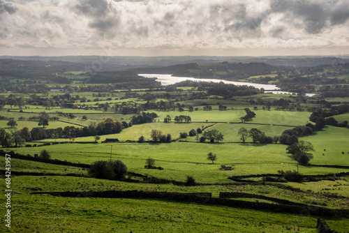 Beautiful wide vista landscape image of English countryside in Peak District National Park late afternoon early Autumn