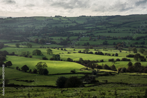 Beautiful wide vista landscape image of English countryside in Peak District National Park late afternoon early Autumn © veneratio
