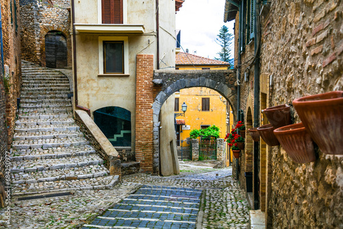 Fototapeta Naklejka Na Ścianę i Meble -  Traditional medieval villages of Italy - picturesque old floral streets of Casperia, Rieti province.