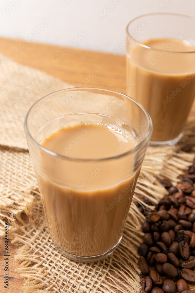 Brazilian cup of coffee with milk in American glass Brazilian cup of coffee with milk in American glass