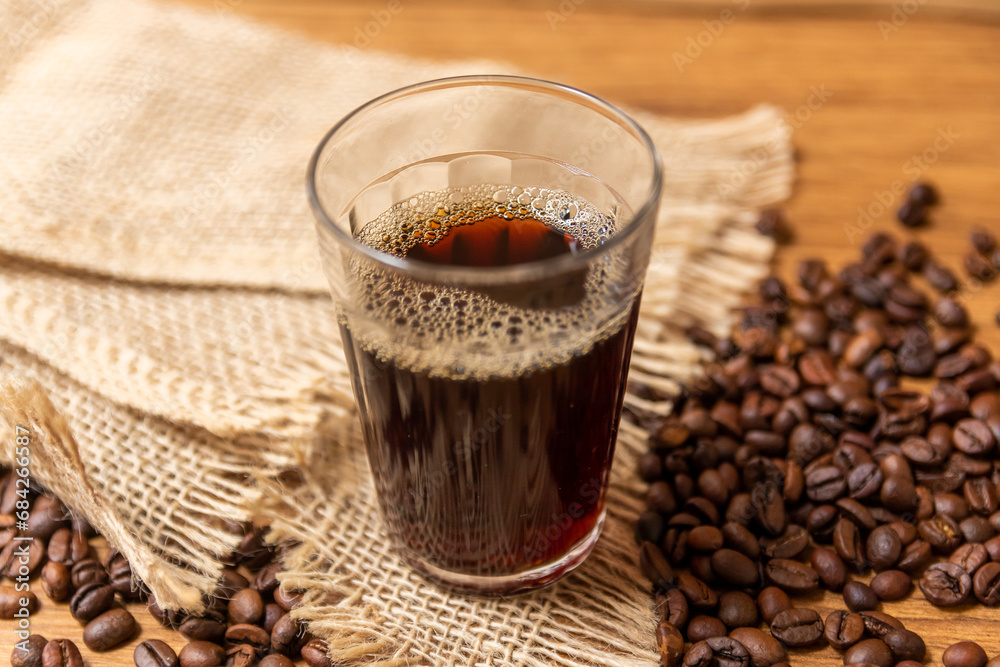 Cup of coffee in American glass, Typical Breakfast in brazil. Cup of coffee in American glass, Typical Breakfast in brazil.