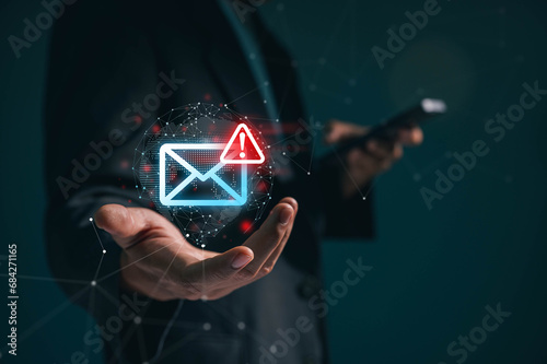 A businessman receives emails from the international community along with notifications about viruses, spam, junk mail, and hackers. Network security concepts