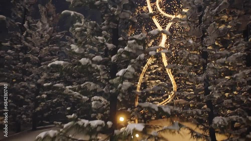 3D Animated Scene Of Fireworks Illuminates Forest Rushing Through To Lake Spiralling To Form Christmas Tree Shape.