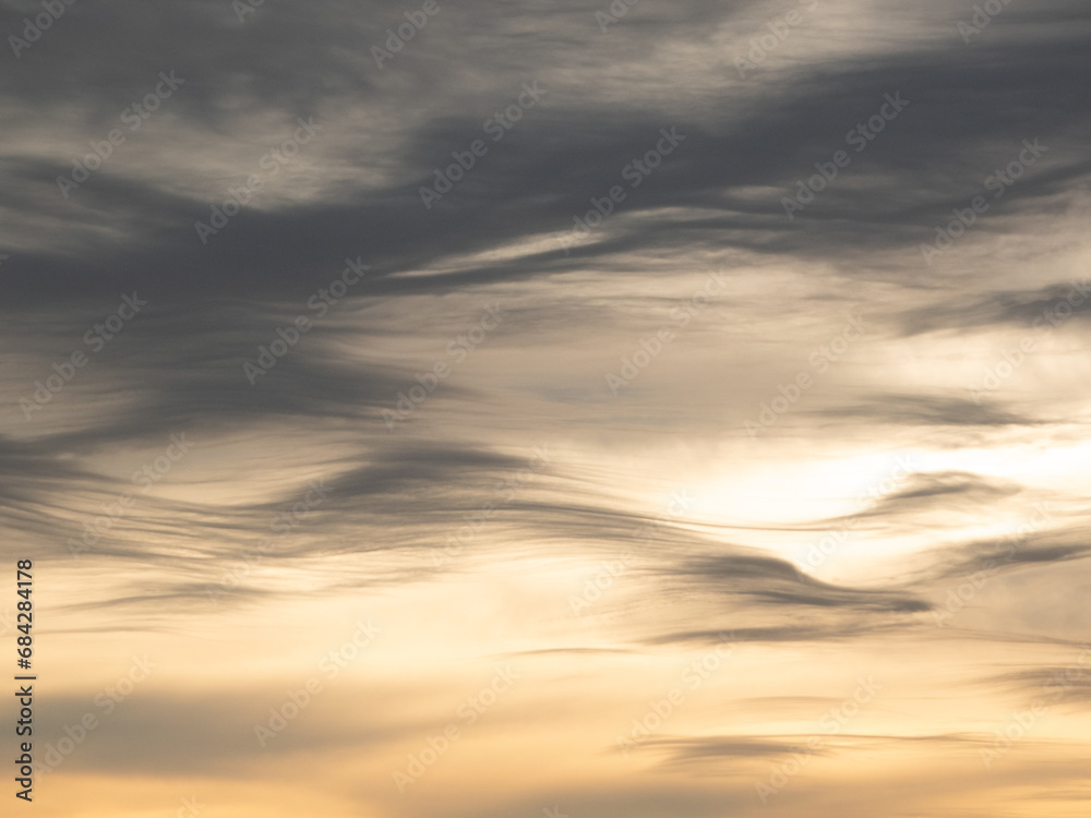 Sunset fall sky with whispy cirrus clouds