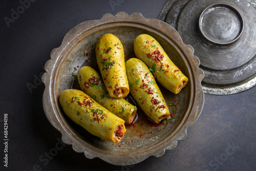 Stuffed zucchini with meat from traditional Turkish cuisine. Turkish name; etli kabak dolmasi photo