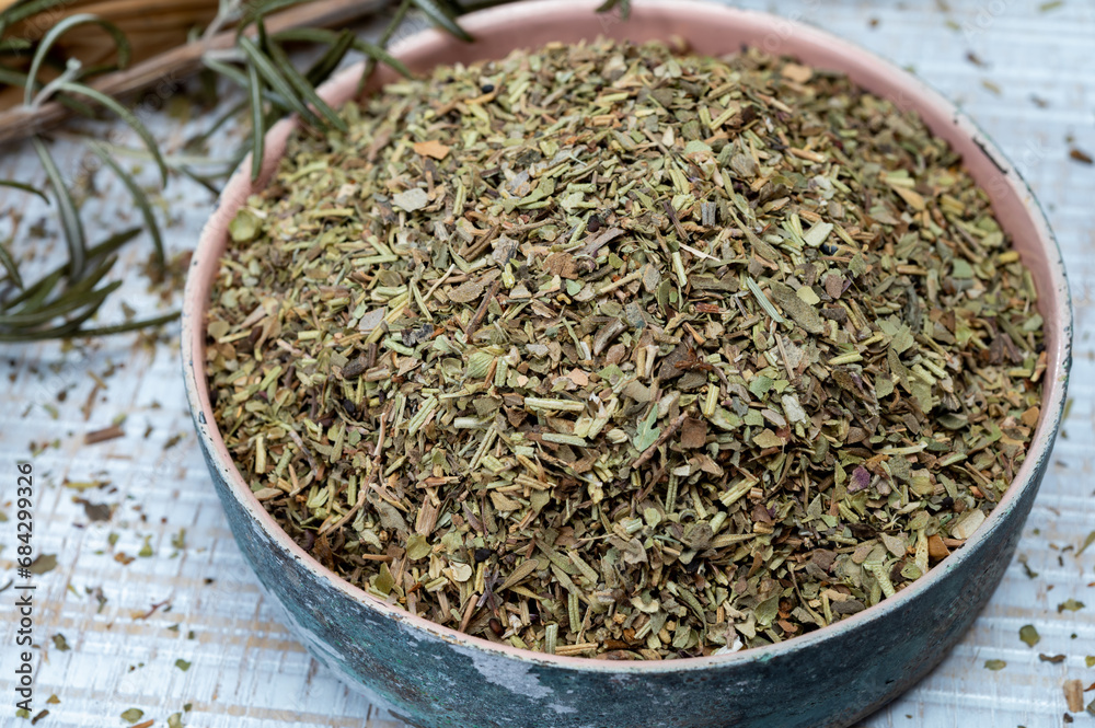 Herbes de Provence, mixture of dried herbs typical of the Provence region, blends often contain savory, marjoram, rosemary, thyme, oregano, lavender leaves, used with grilled food and stew Herbes de Provence, mixture of dried herbs typical of the Provence region, blends often contain savory, marjoram, rosemary, thyme, oregano, lavender leaves, used with grilled food and stew