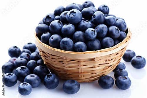 Blueberries in a wicker basket on a white background