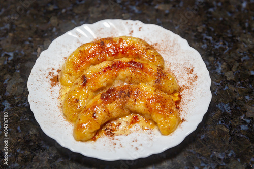 Traditional banana flambéed in butter and cinnamon powder