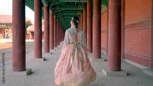 A graceful smile in traditional Hanbok at Changdeokgung palace, capturing the beauty of Korean culture