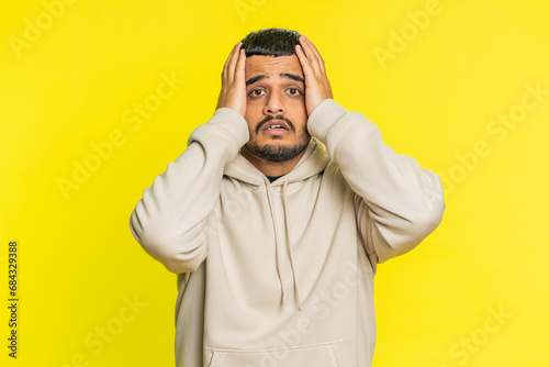 Картината върху платно Sad young Indian man feeling hopelessness loneliness, nervous breakdown, loses becoming surprised by lottery results bad fortune loss unlucky news