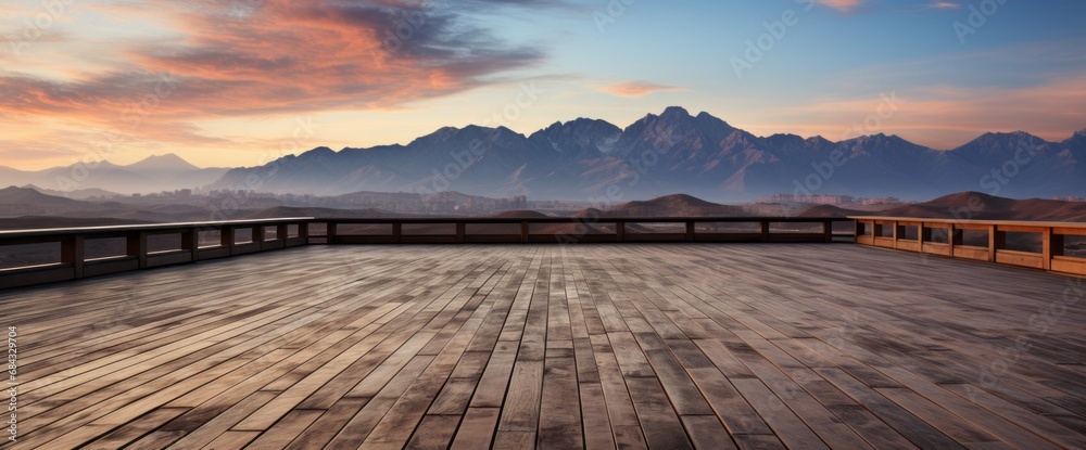 Empty wooden deck, empty wooden deck against the landscape, providing an open perspective.