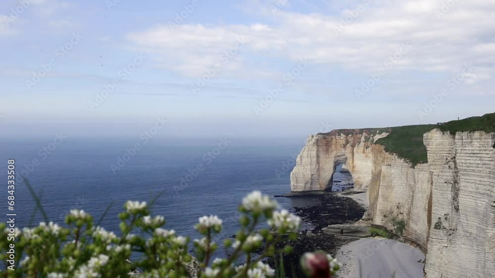 Aerial 4k drone view of Etretat. L'Aiguille, The Needle, Famous Alabaster chalk seacoast, Porte Aval cliffs, Natural Rock Arch Of Étretat, Normandy, France, Atlantic Ocean, French holidays, landscape Aerial 4k drone view of Etretat. L'Aiguille, The Needle, Famous Alabaster chalk seacoast, Porte Aval cliffs, Natural Rock Arch Of Étretat, Normandy, France, Atlantic Ocean, French holidays, landscape