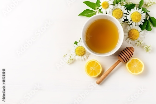 Chamomile tea cup with honey, ginger and lemon, top wiev, flat lay, copy space © Nate