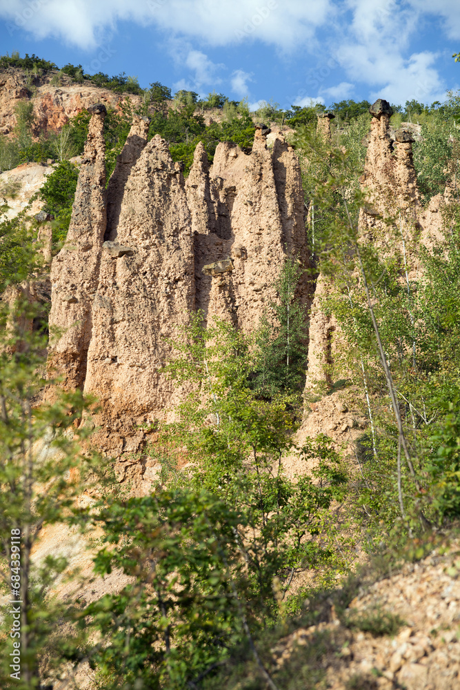 Vertical image of a natural phenomenon rock formation in Devil's town, Djavolja varos, Serbia.