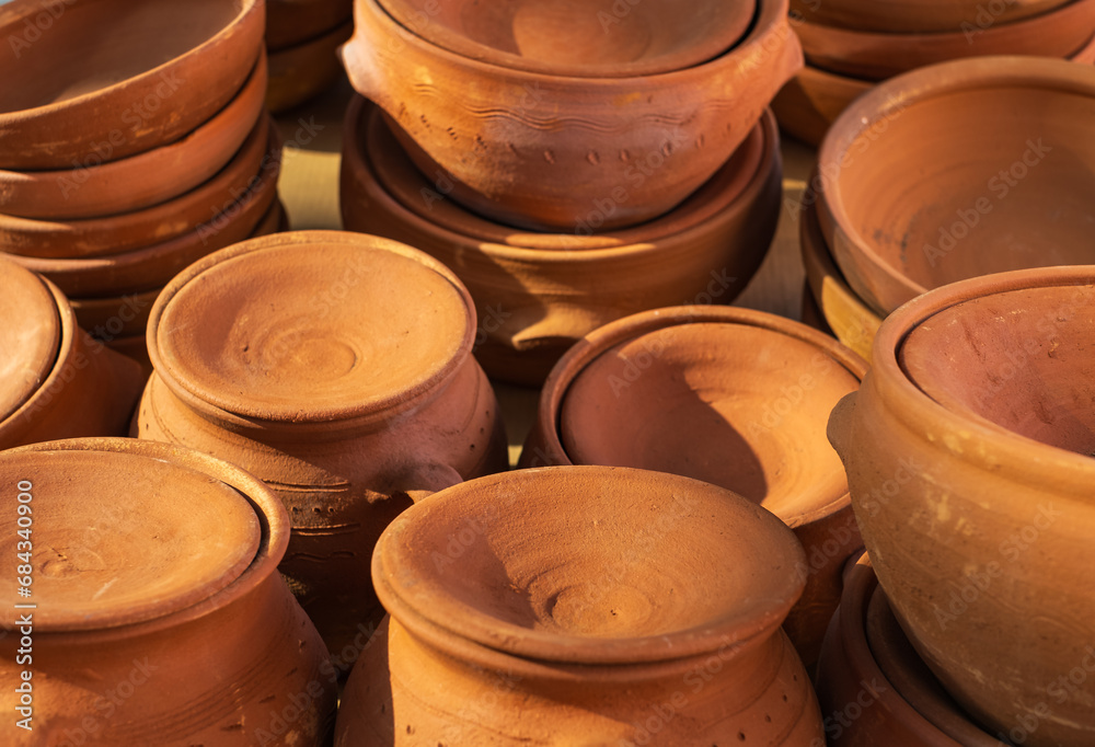 Handmade ceramic new empty craft ceramic plates, bowls and lids. Pottery Craft Ceramic Clay Pottery made by Human Hand. Handmade ceramic new empty craft ceramic plates, bowls and lids. Pottery Craft Ceramic Clay Pottery made by Human Hand.