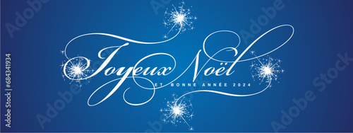 Merry Christmas and Happy New Year French language beautiful white light elegant brush script calligraphy typography sign with glitter sparkle fireworks at calligraphic endigs blue background greeting